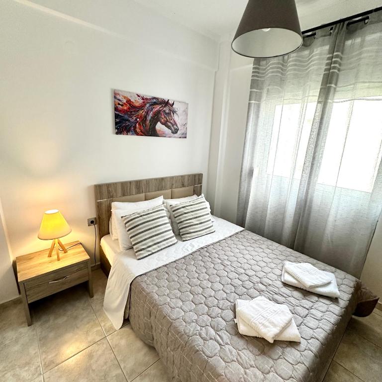 Postel nebo postele na pokoji v ubytování R&T Apartments