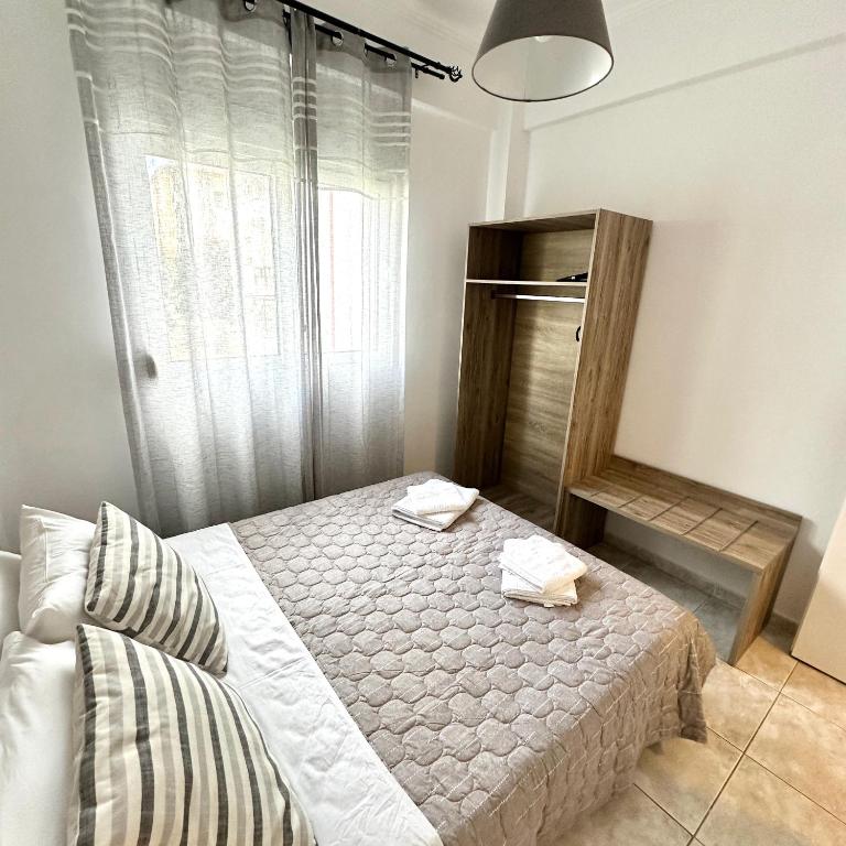 Postel nebo postele na pokoji v ubytování R&T Apartments