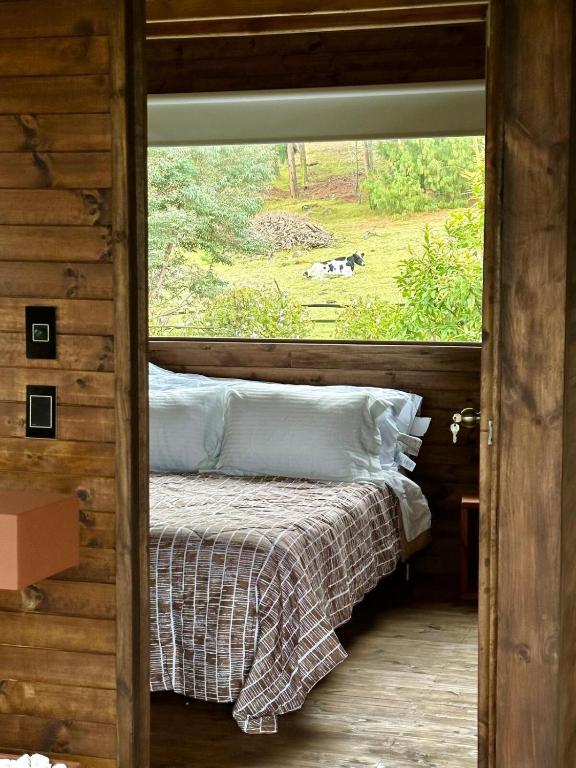 Postel nebo postele na pokoji v ubytování ACOGEDOR REFUGIO PRiVADO