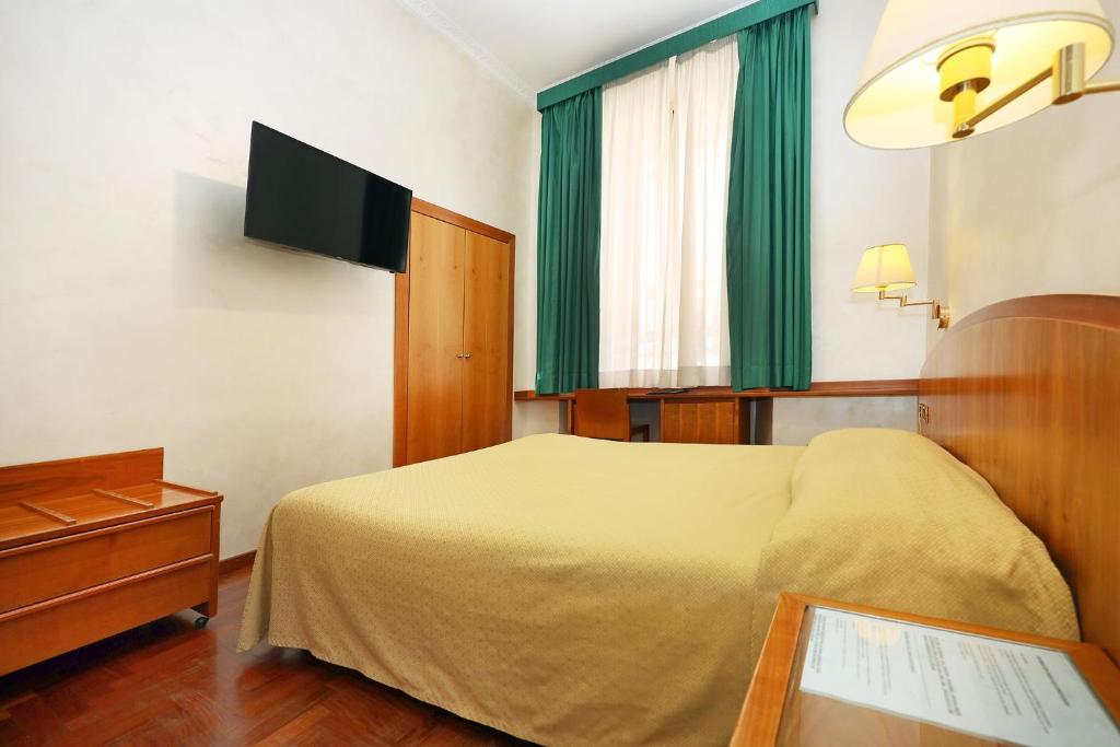 TV a/nebo společenská místnost v ubytování Hotel Corot