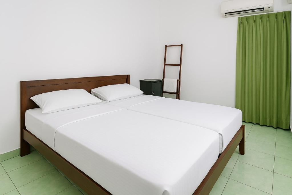 Postel nebo postele na pokoji v ubytování Hostel Colombo Airport