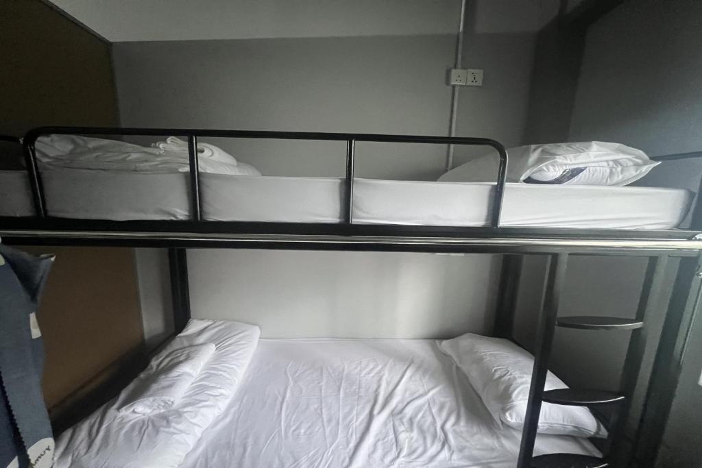 Postel nebo postele na pokoji v ubytování Makotel Hostel Ipoh