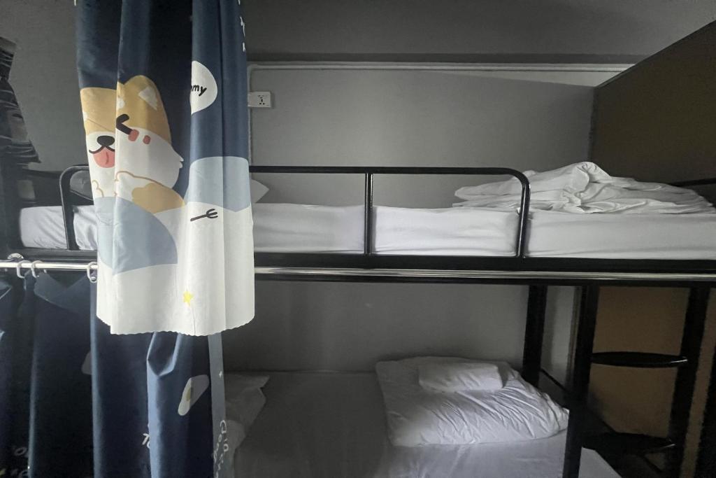 Postel nebo postele na pokoji v ubytování Makotel Hostel Ipoh