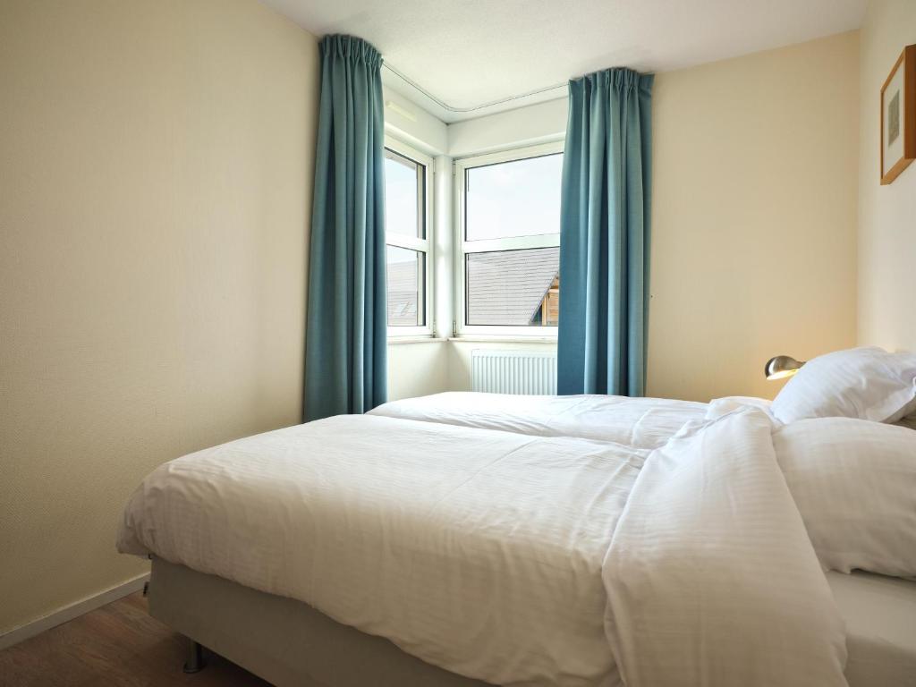 Dormio Resort Berck-sur-Mer tesisinde bir odada yatak veya yataklar