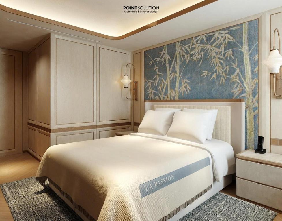 La Passion Saigon Hotelにあるベッド