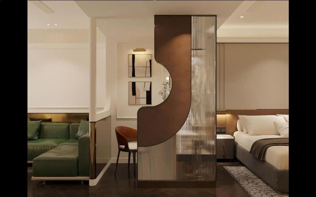 La Passion Saigon Hotelにあるベッド