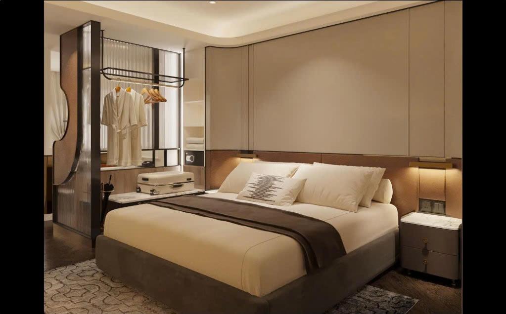 La Passion Saigon Hotelにあるベッド