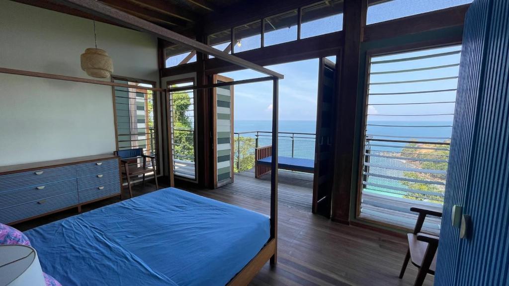 Ένα ή περισσότερα κρεβάτια σε δωμάτιο στο The Retreat Koduko Sanctuary