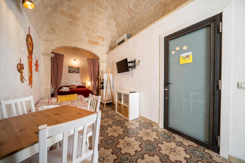 Postel nebo postele na pokoji v ubytování POLIGNANO BONITA