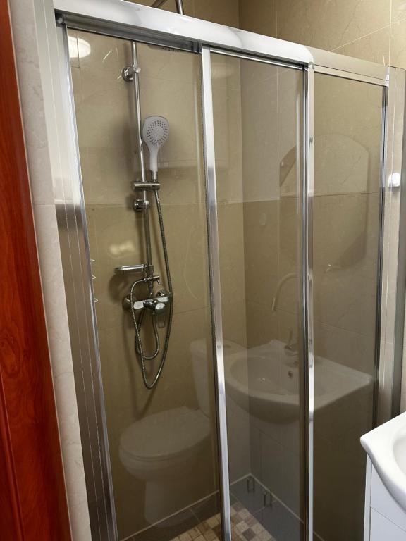 Kúpeľňa v ubytovaní Pokoje goscinne Miedzywodzie