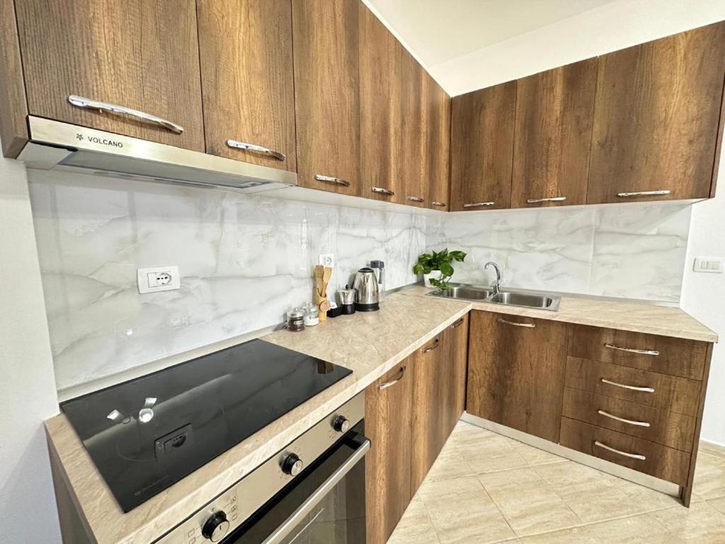 Кухня или кухненски бокс в TreA Accomodations- Vola