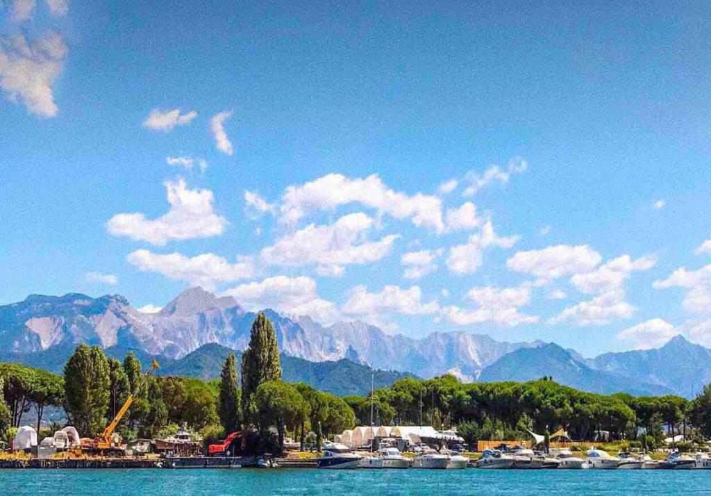 a view of a harbor with boats in the water at Romantica Dimora Bocca di Magra in Bocca di Magra