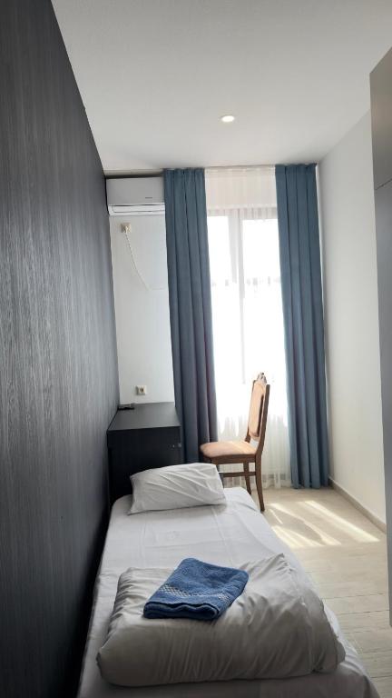 Voodi või voodid majutusasutuse Star Hotel toas