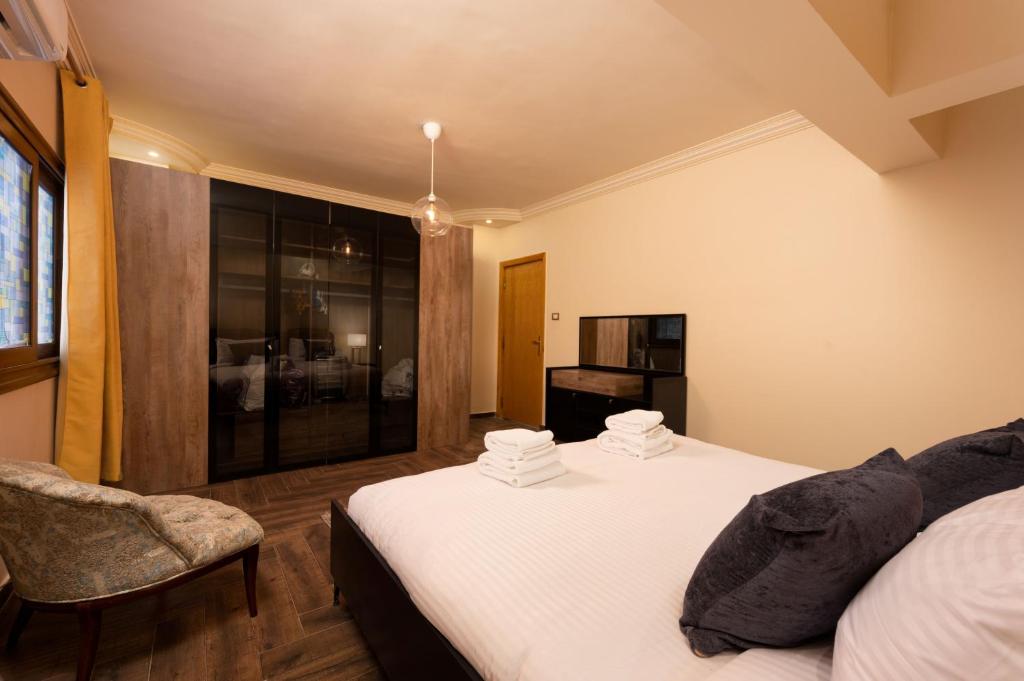 Postel nebo postele na pokoji v ubytování VESTA - Heliopolis Residence