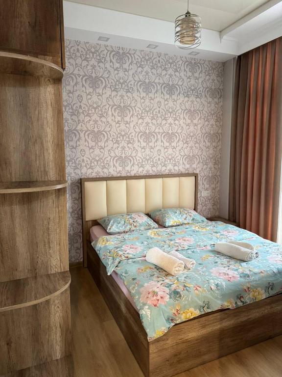 Postel nebo postele na pokoji v ubytování Marika apartment