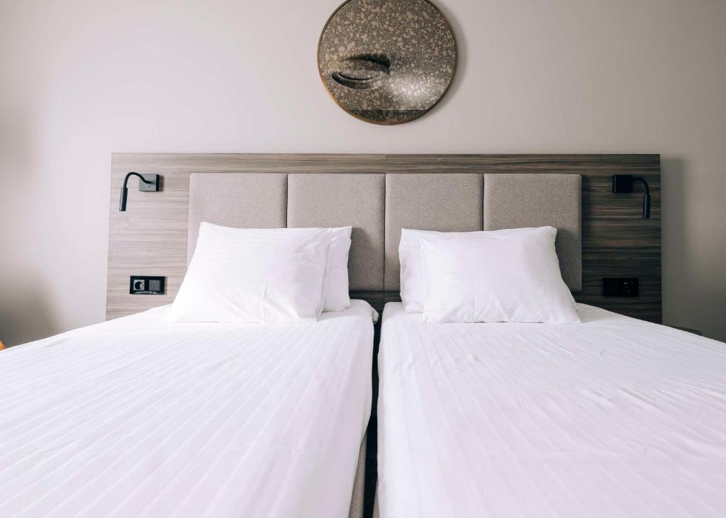 Postel nebo postele na pokoji v ubytování Best Western Plus Kalmarsund Hotell