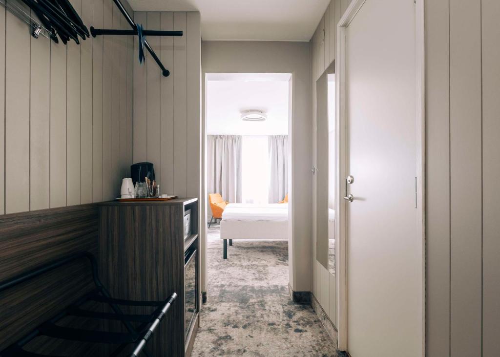 Postel nebo postele na pokoji v ubytování Best Western Plus Kalmarsund Hotell