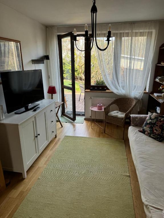TV a/nebo společenská místnost v ubytování Na Husovce