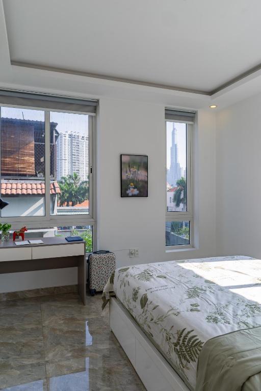 Postel nebo postele na pokoji v ubytování Thao Dien Coliving 2