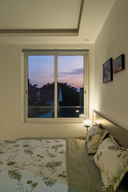 Postel nebo postele na pokoji v ubytování Thao Dien Coliving 2