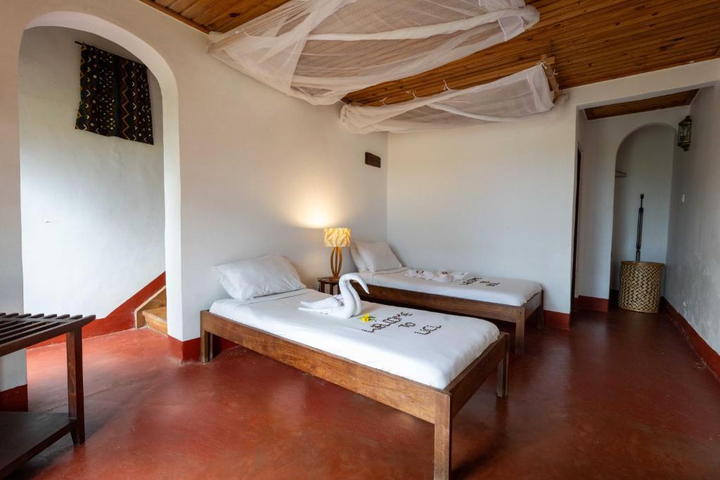 Utengule Coffee Lodge - Camera Duplex (3 Adulti + 1 Bambino)