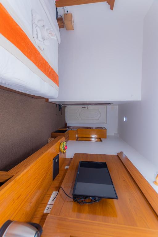 Postel nebo postele na pokoji v ubytování Amber Royel Hotel