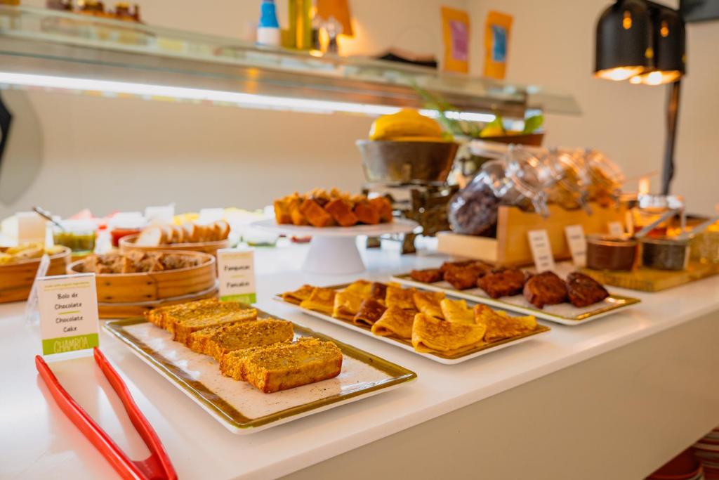 A close view of a pastry and dessert section in the breakfast buffet.