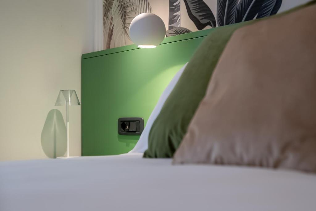 Postel nebo postele na pokoji v ubytování Lux Santa Lucia
