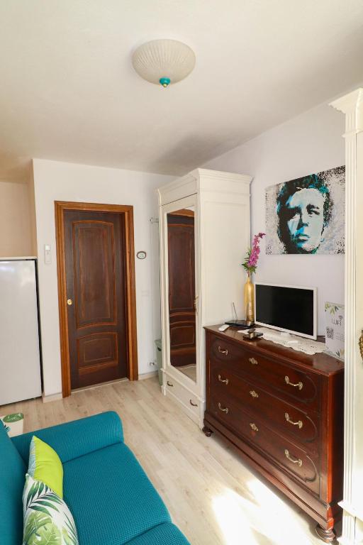 TV a/nebo společenská místnost v ubytování La Riva