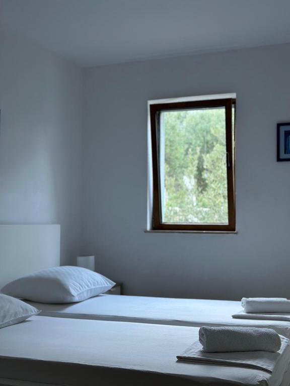 Postel nebo postele na pokoji v ubytování Apartments Marković