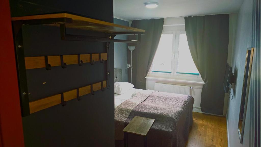 Postel nebo postele na pokoji v ubytování Hotel Delisa