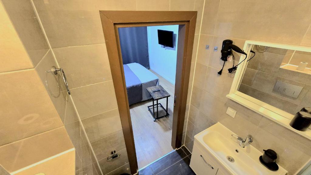 Koupelna v ubytování Hotel Delisa