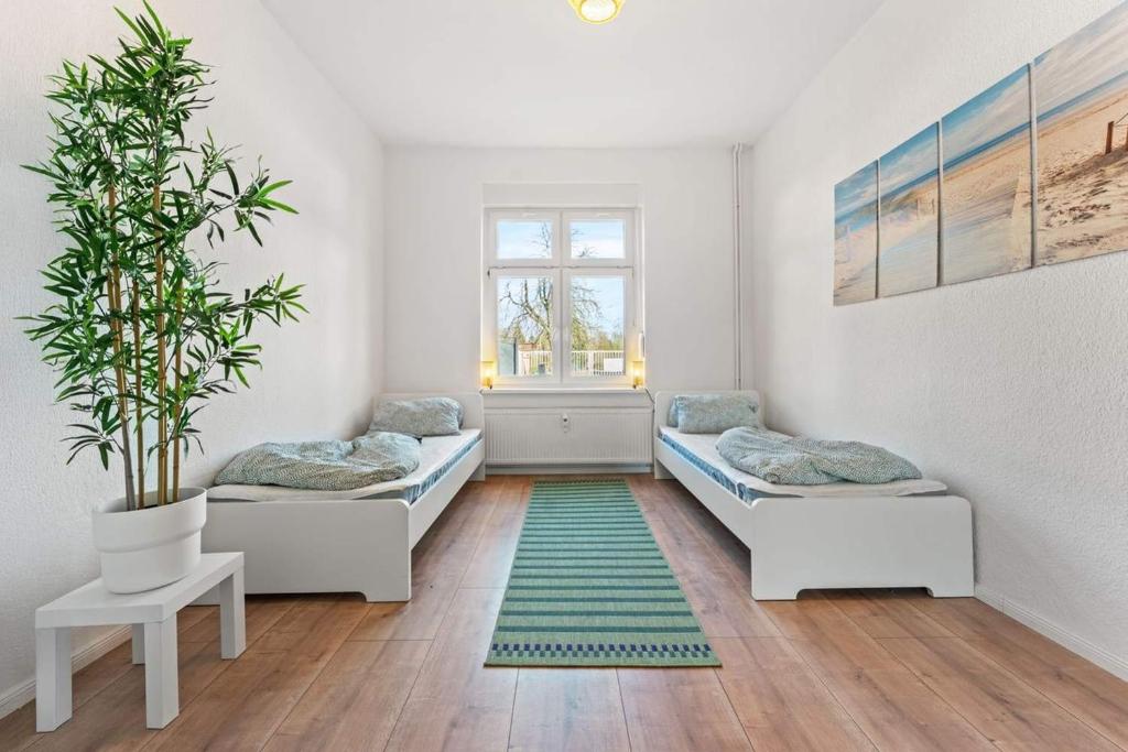Postel nebo postele na pokoji v ubytování Spacious Apartment in Eberswalde