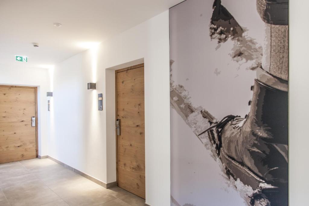 Fotografie z fotogalerie ubytování Hubertus Logis Apartments v destinaci Brixen im Thale