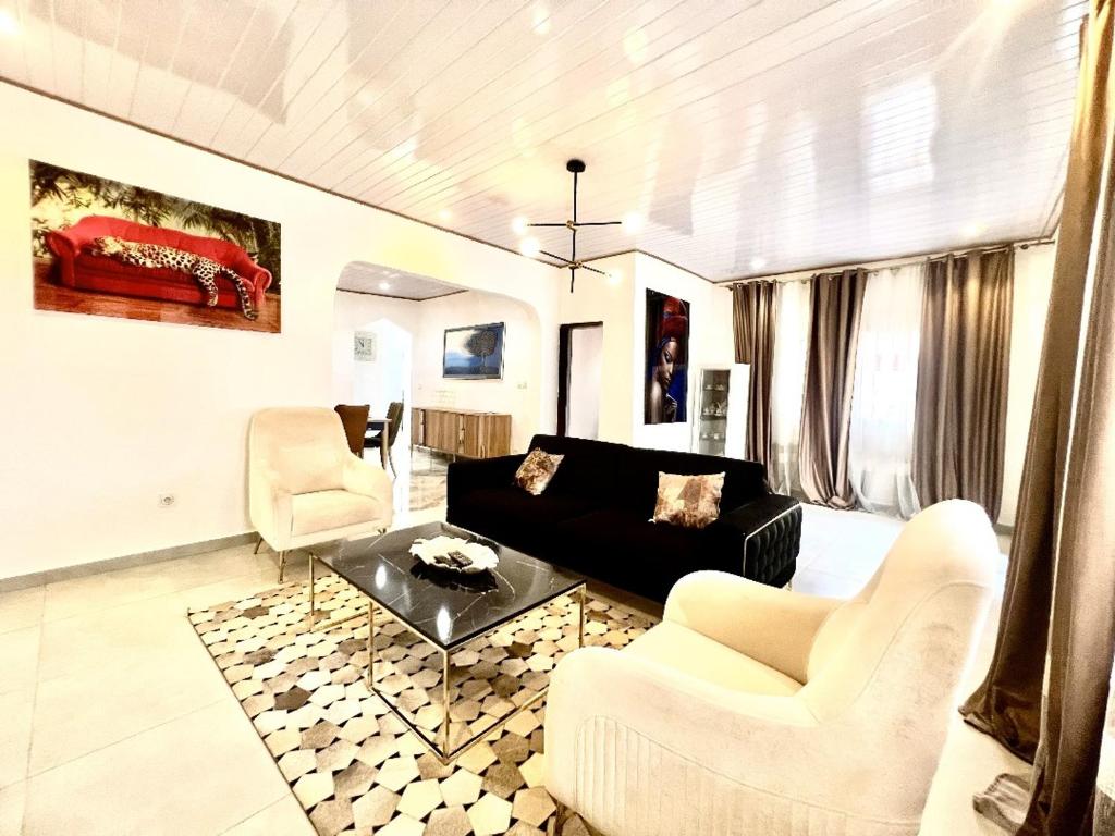 Posezení v ubytování La Maison Blanche