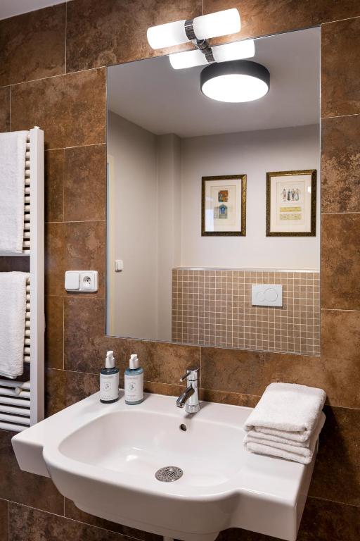 Koupelna v ubytování Hotel Unique