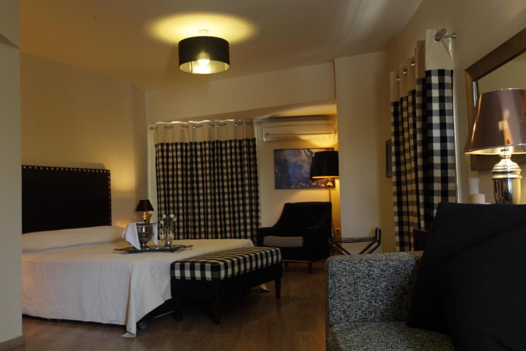 Postel nebo postele na pokoji v ubytování Mati Hotel