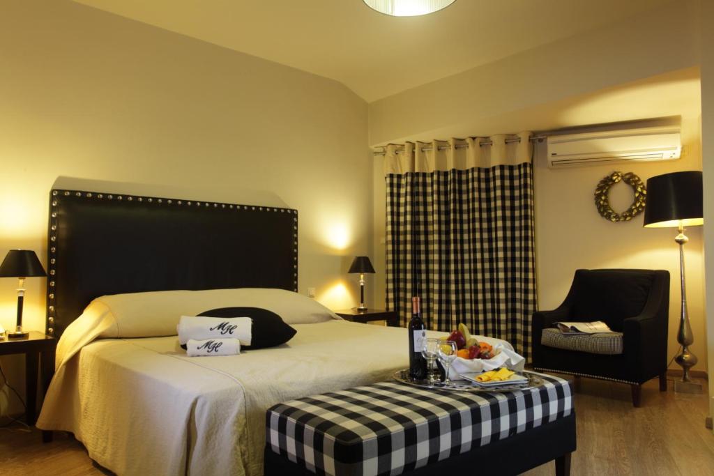 Postel nebo postele na pokoji v ubytování Mati Hotel