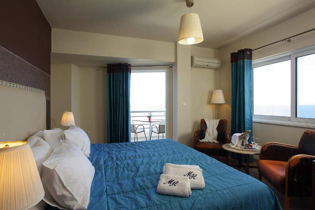 Postel nebo postele na pokoji v ubytování Mati Hotel