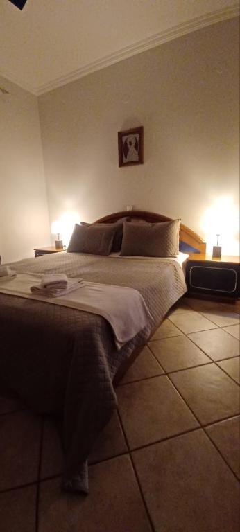 Postel nebo postele na pokoji v ubytování Tzitzi Pistachio Villa