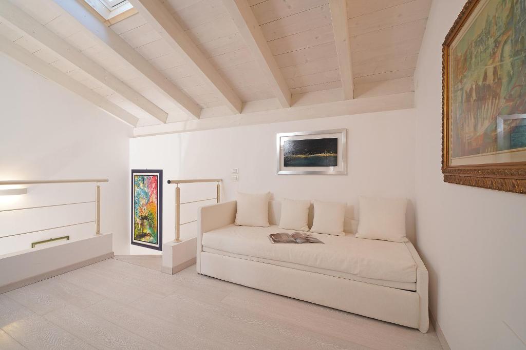 Televízia a/alebo spoločenská miestnosť v ubytovaní Resort Caesar C4 Sirmione - Gardagate