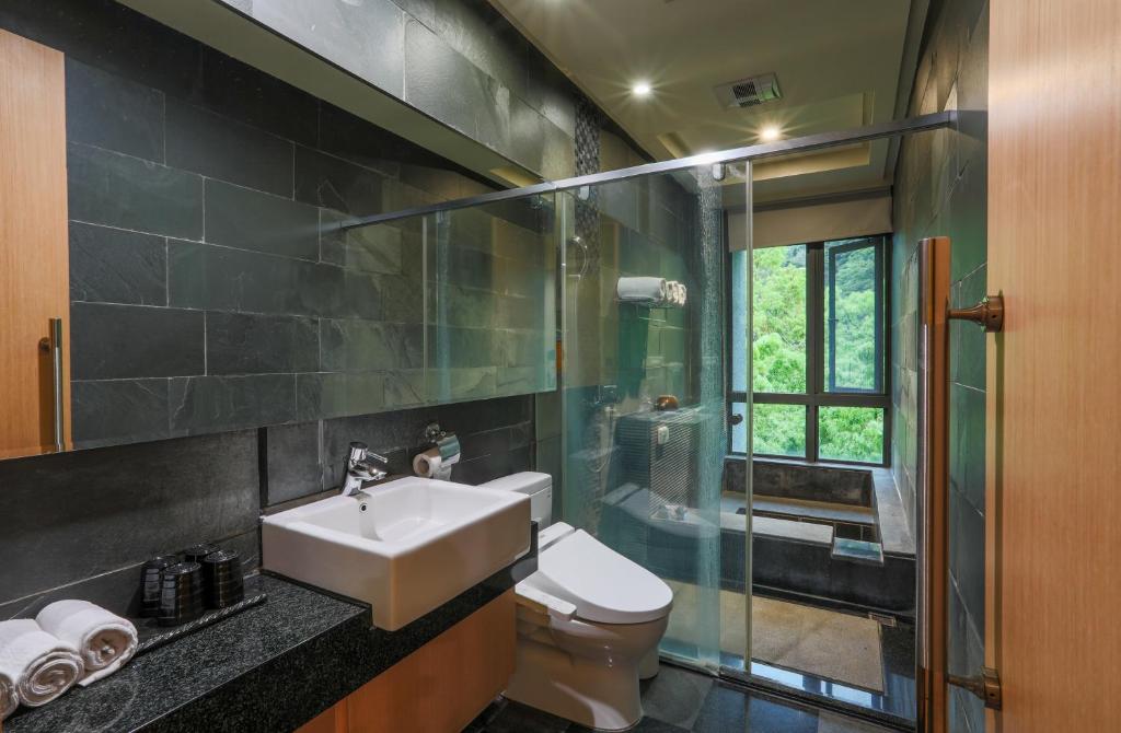 Koupelna v ubytování 日出溫泉飯店Sunrise Hot Spring Hotel