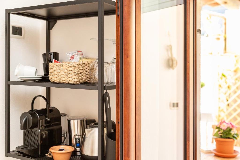 Kuchyň nebo kuchyňský kout v ubytování B&B Calamoresca