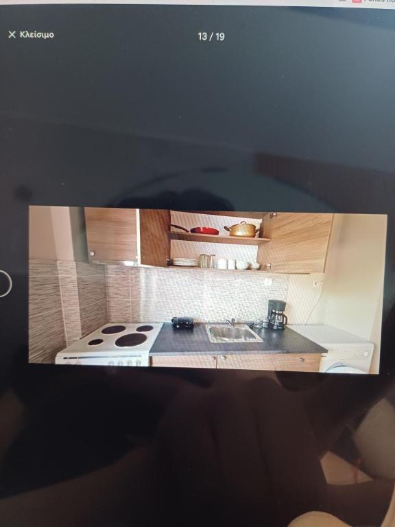 Η κουζίνα ή μικρή κουζίνα στο Panos house 2
