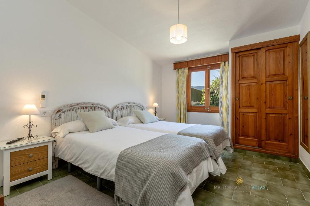 Postel nebo postele na pokoji v ubytování Villa La Sort Llarga, casa de campo para 6 personas