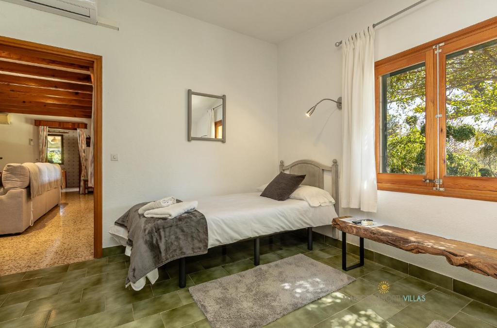Postel nebo postele na pokoji v ubytování Villa La Sort Llarga, casa de campo para 6 personas