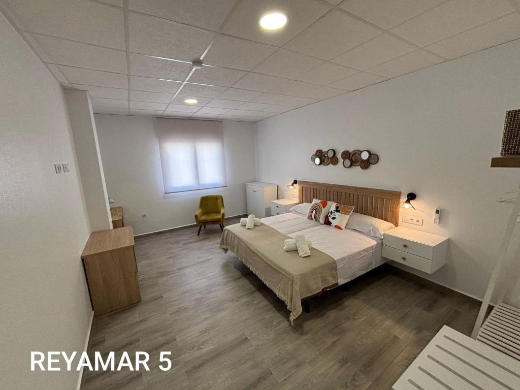 Postel nebo postele na pokoji v ubytování Apartamentos Reyamar