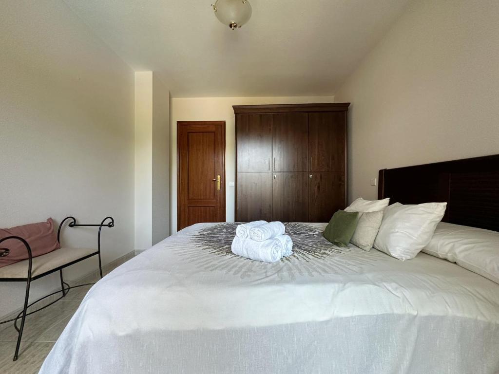 A bed or beds in a room at La Barrosa