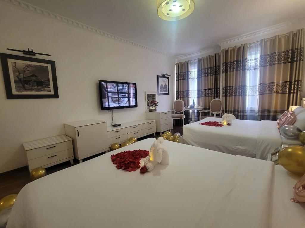 Postel nebo postele na pokoji v ubytování Luxor Boutique Hotel