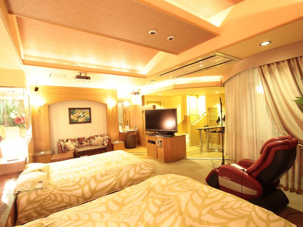 Televiisor ja/või meelelahutuskeskus majutusasutuses G HOTEL 一宮 -Hotel & Resorts-